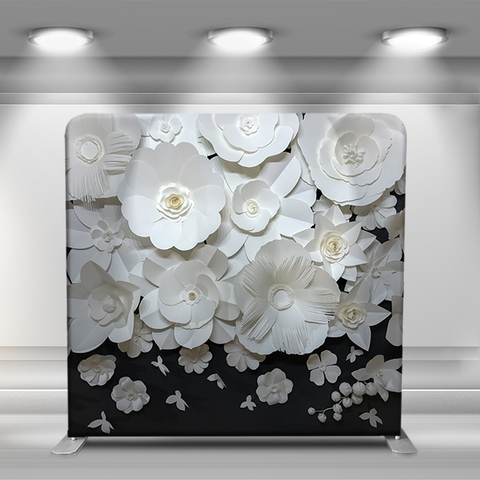 White flowers stacked on black background