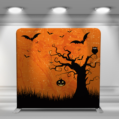 Halloween pumpkin head, tree and bats