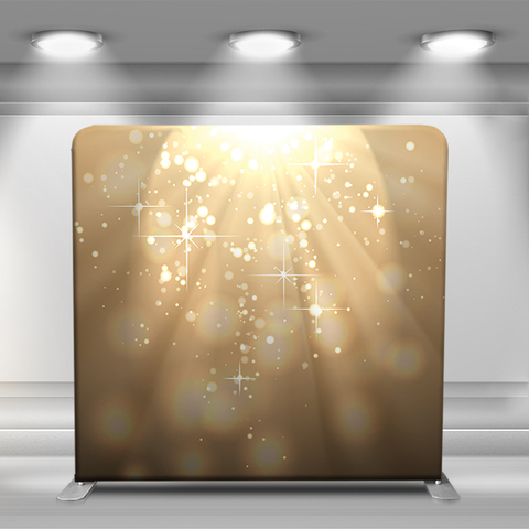 Golden glitter falling on dark background